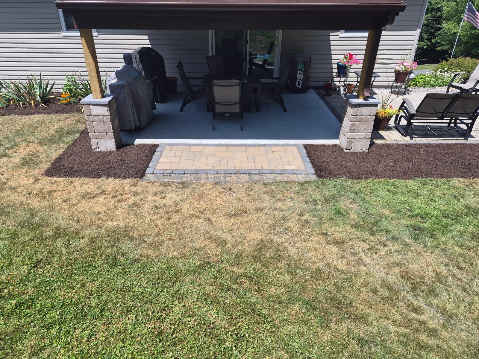 Backyard paver patio and covered outdoor living area in Schuylkill County PA